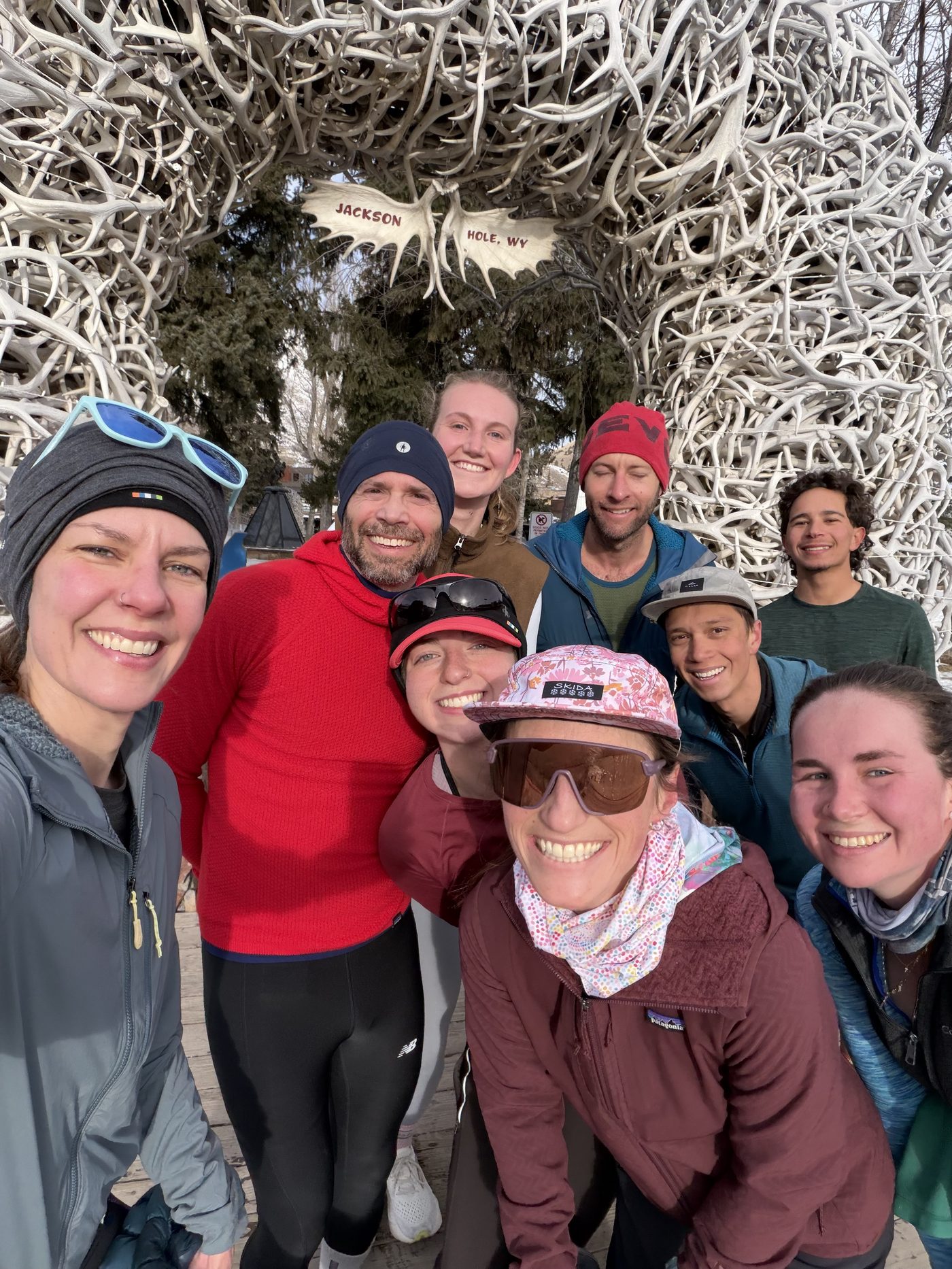 Rendezvous Run Club group at the Jackson Hole antler arch